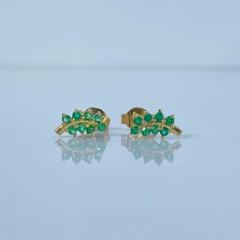 Topos Cruz de oro 18K con esmeraldas